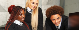 Learners around a computer with text: Personal Project